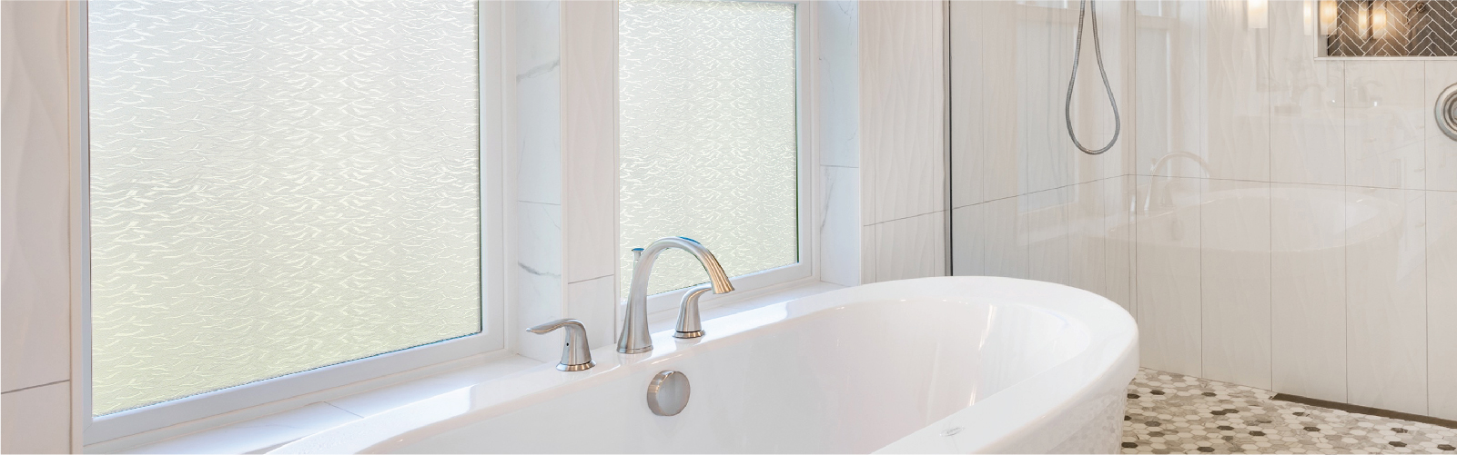 Interior view of bathroom windows changed with decorative film 